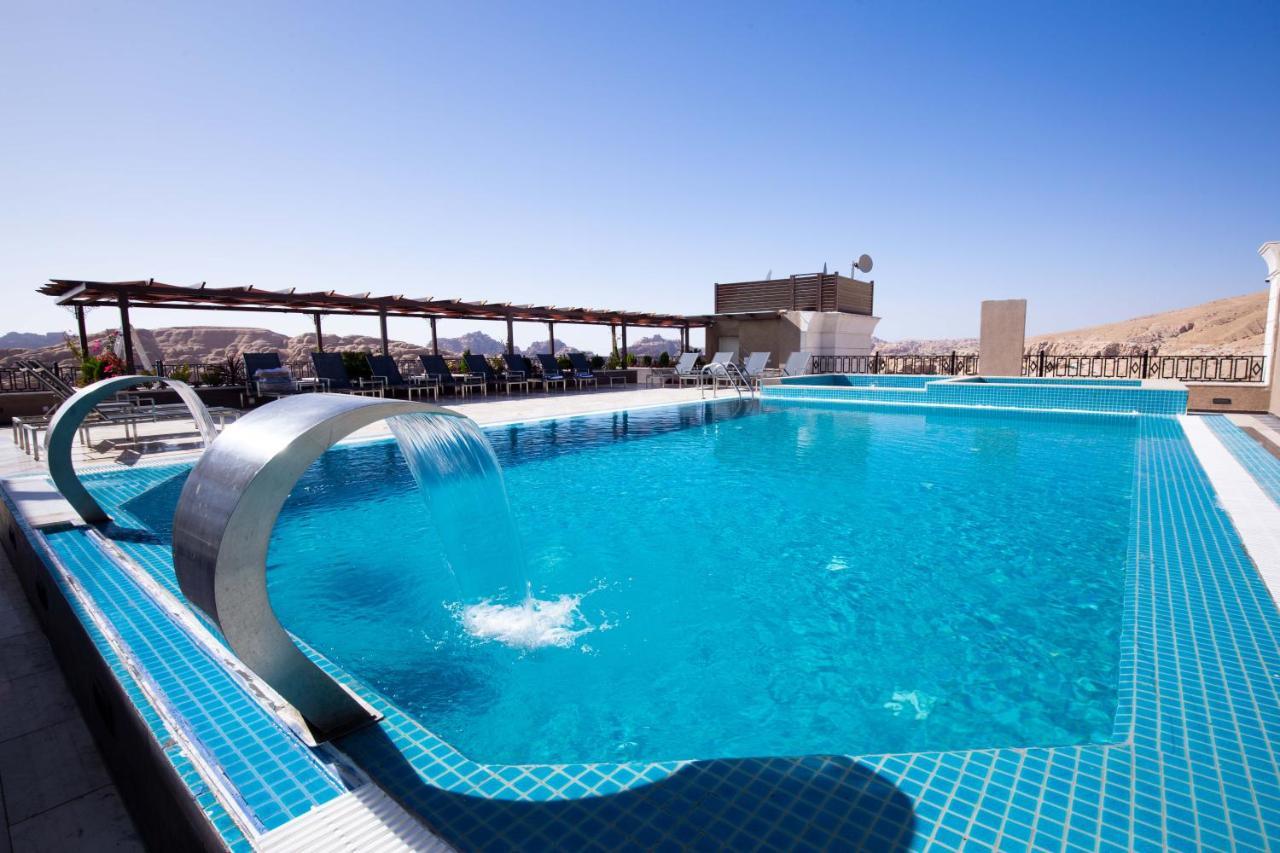 Petra Moon Luxury Hotel Wadi Musa Exterior photo Rooftop pool at the Grand Hotel