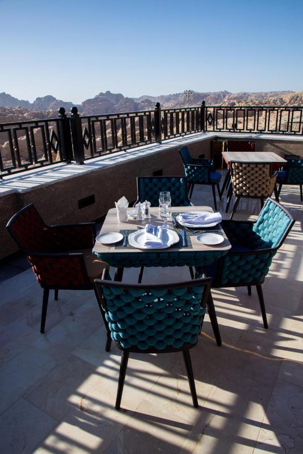 Petra Moon Luxury Hotel Wadi Musa Exterior photo A table set for four at a restaurant